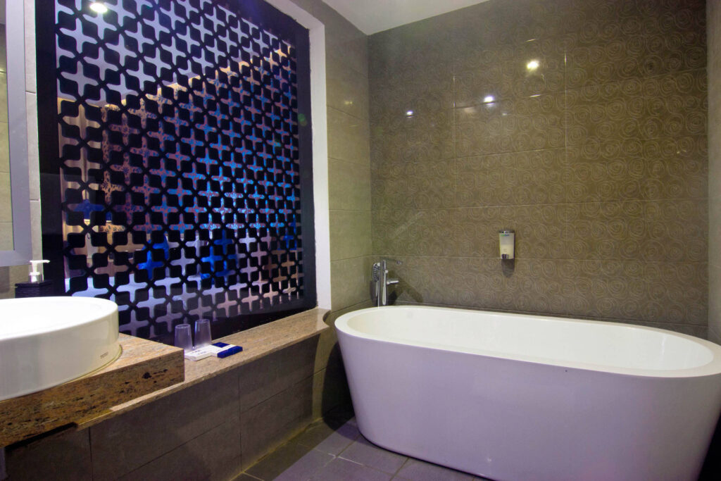 The Deluxe Room - bathroom at Natya Hotel Kuta